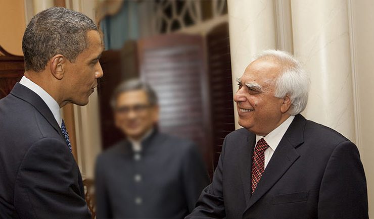 Sibal sees role for PSUs in adult education programme at Stock Watch